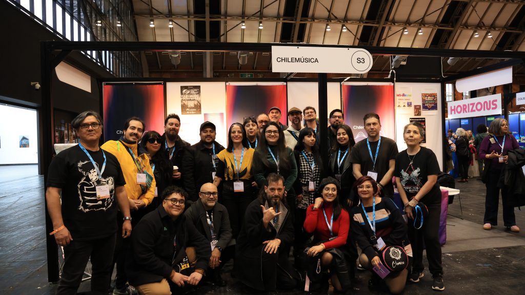 Chilean delegation in front of the CHILEMUSICA stand at WOMEX 2024 (photo by Esteban Perez)